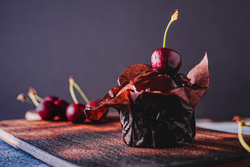 chocolate cupcake with a cherry