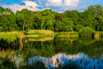 Obraz na płótnie Canvas Warsaw, Poland - Panoramic view of the Szczesliwicki Park - one of the largest public parks in Warsaw - in the western part of the Ochota district