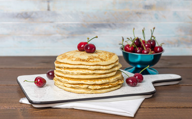 Sweet Homemade Stack of Pancakes with cherries