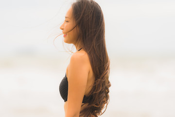 Naklejka premium Portrait beautiful young asian woman wear bikini on the beach sea ocean