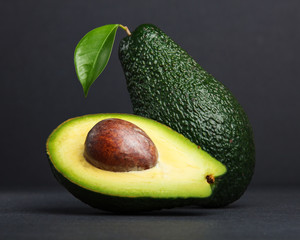 Fresh, raw avocado on a black background