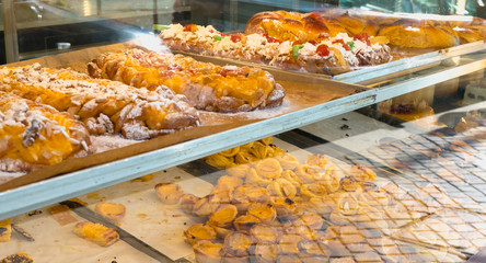 succulent Portuguese pastries displayed in Porto, Portugal