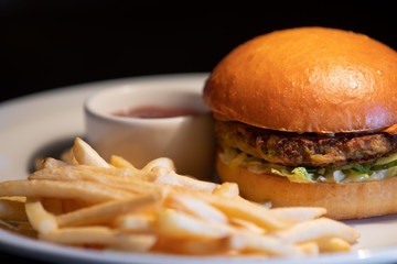 Burger and fast food in the plate, unhealthy food