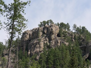 Fototapeta na wymiar Imposing rock formations provide beautiful views along Needles Highway at Custer State Park, South Dakota.