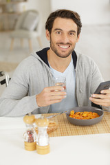 Fototapeta na wymiar happy man having breakfast