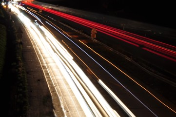 Fototapeta na wymiar Car light lines on a higway during trafic jam at night