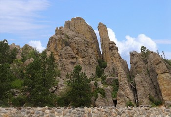 Fototapeta na wymiar Dramatic shapes of granite cliffs and rock formations along Needles Highway at Custer State Park, South Dakota.