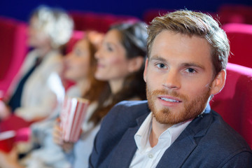 man focused picture in the cinema