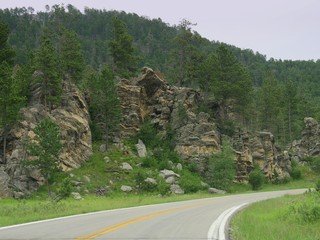 Rock formations border the road making drives along Needles Highway an unforgettable experience at Custer State Park, South Dakota.