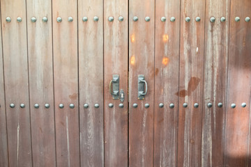 Vintage wooden gate door in the old building of the historic town of Kaleici.