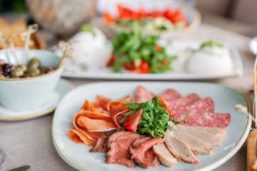 Gala dinner, serving table for birthday or wedding. Different meals for the guests on Banquet. delicious dishes on the table in the restaurant.