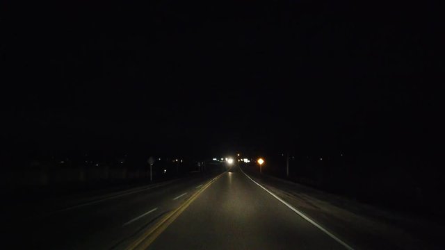 Driving Down In Country Road At Night In Black Jeep First Person View With Oncoming Traffic