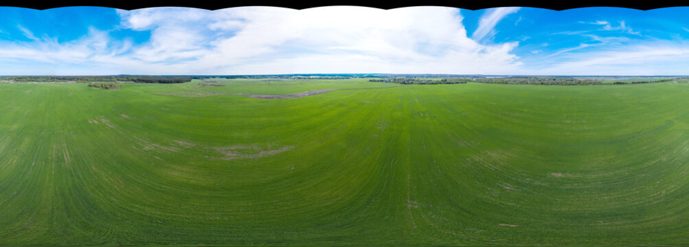 360 panoramic view from the air without the sky on green agricultural fields