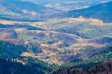 Beautiful spring mountain landscape. Fabulous view of the hills and valleys in Poland.
