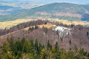 Naklejka premium Beautiful spring mountain landscape. Fabulous view of the hills and valleys in Poland.