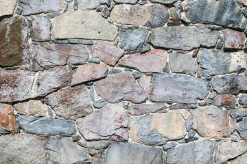 Wall of large natural stones.