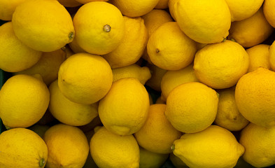 Lemon raw many on the basket in market background and department store. displayed is sale, Foods concept.