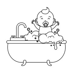 cute little baby boy bathing in the bathtub
