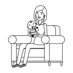mother lifting little baby seated in sofa