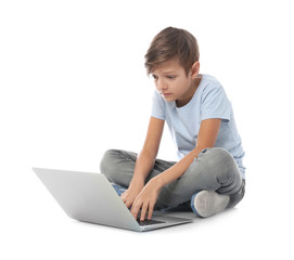 Shocked child with laptop on white background. Danger of internet