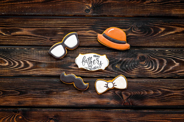 hat, moustache, glasses, bow tie and copy for Happy Father Day party on wooden background top view
