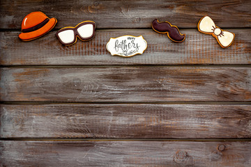 Happy Father Day with bow tie, moustache, glasses and hat cookies on white background top view mockup
