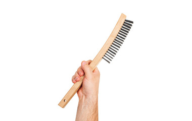 Tool. Hand is holding wire metal brush on a white background .