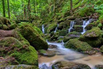 Wild romantic hiking trail along famous Gertelbach waterfalls, Black Forest, Germany