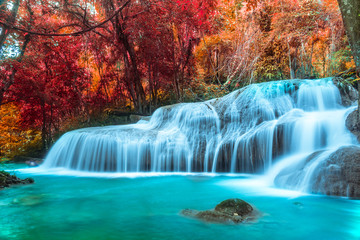 A Colorful forest in Autumn season Pha Tad Waterfall at Kanchanaburi,Thailand is Amazing nature.