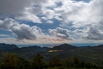 Fototapeta premium Blue sky high peak mountains fog hills mist scenery national park views at Phu Tub Berk, Khao Koh, Phetchabun Province, Thailand