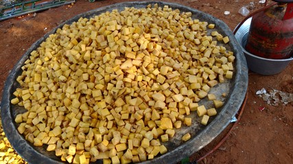 elephant foot yam pieces to cook a south Indian recipe in a traditional marriage