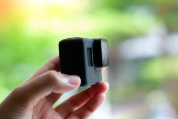 Action camera, equipment for extreme sports On a green background