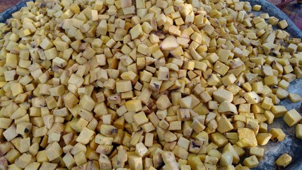 elephant foot yam pieces to cook a south Indian recipe in a traditional marriage