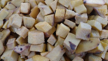 elephant foot yam pieces to cook a south Indian recipe in a traditional marriage