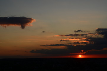 Sunset silhouette of church cross at sunset