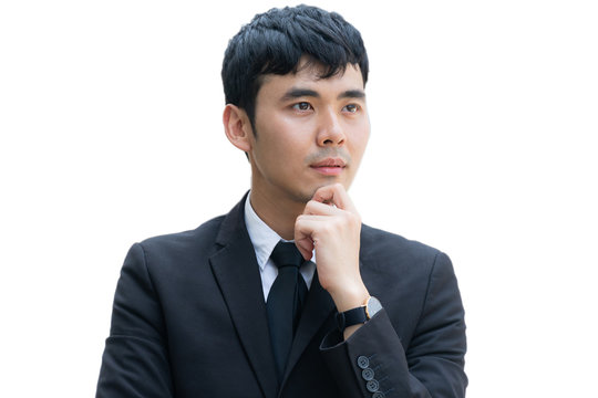 Asian Business Man In The Formal Suit. On White Blackground.