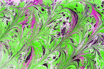 Beautiful abstract Ebru drawing technique .Turkish style of painting Ebru on water with acrylic paints twists the waves.A stylish combination of natural luxury