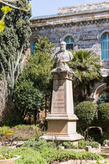 Fototapeta na wymiar Cardinal bust installed in the courtyard of Pools of Bethesda in the old city of Jerusalem, Israel