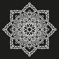 white round symmetrical pattern on black. fancy decorative mandala