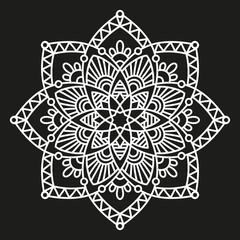 white round symmetrical pattern on black. fancy decorative mandala