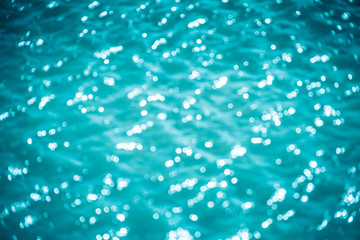 Abstract bokeh from light  in the blue pool