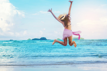 Sexy woman freedom vacation relax on the beach enjoy by run and jumping into the sea