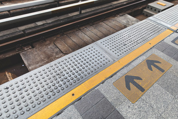 Fototapeta premium arrow symbol on platform sky train