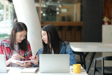 girl teenager studying with computer. college high school student taking note