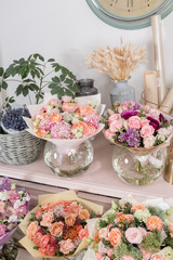 showcase flower shop. Beautiful spring bouquets. Arrangement with mix flowers. Small family business. Work florist. copy space