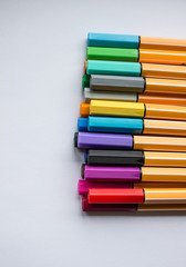 Set of colorful pens on white background