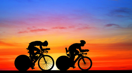 Obraz premium Cycling Silhouette on sunrise background