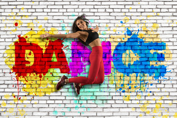 Woman jumping with wall background