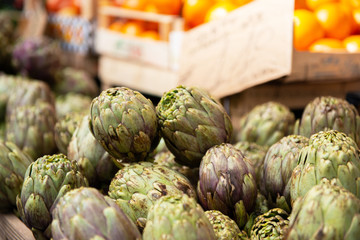 Artichokes. Vegetables market in Italy. Agricultural food. Fresh organic products.