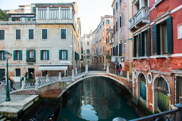 Obraz na płótnie Canvas Picturesque view of ancient buildings, bridge and channel in Venice, Italy. Beautiful romantic italian city. Unique Venetian landscape.